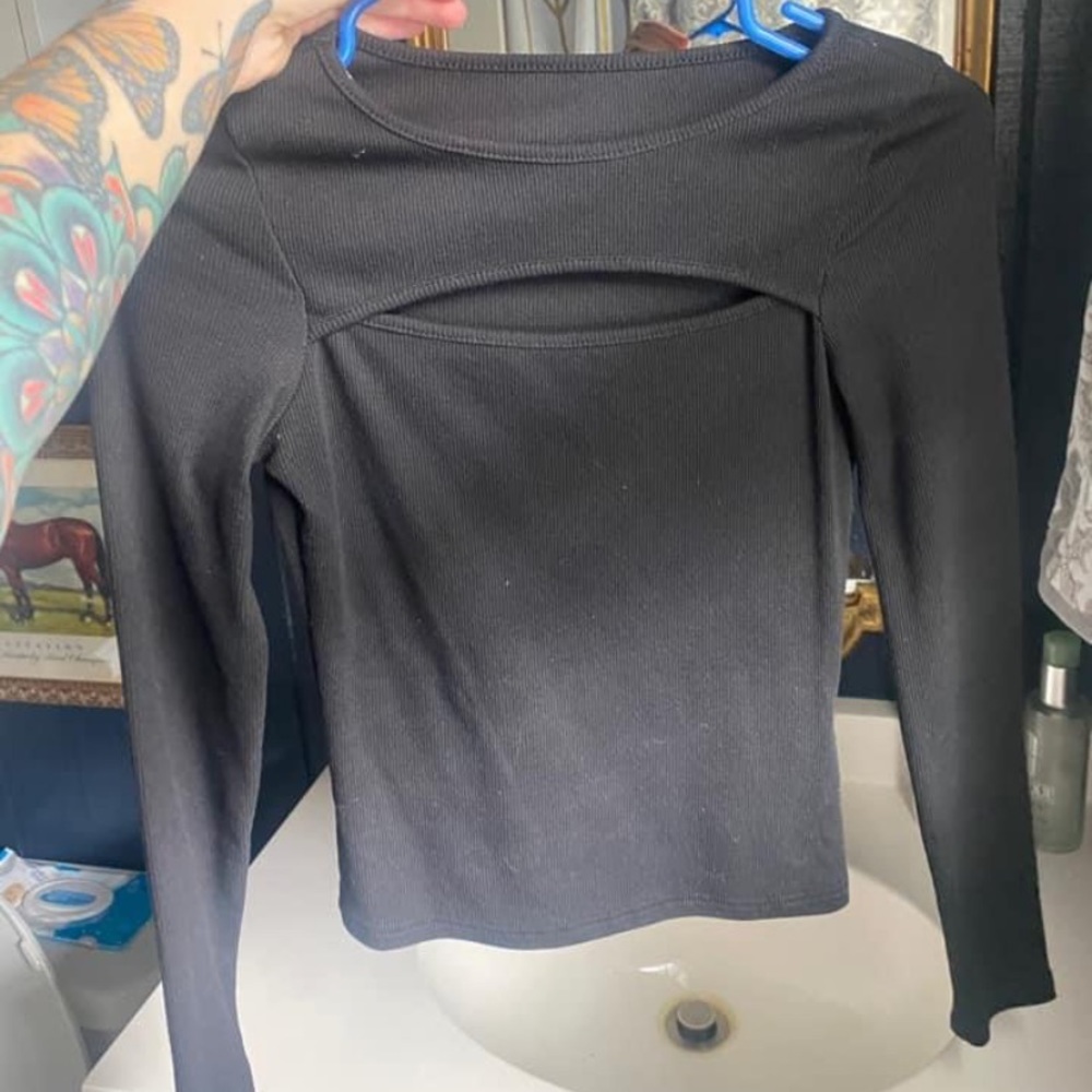 Asymmetrical cut out shirt